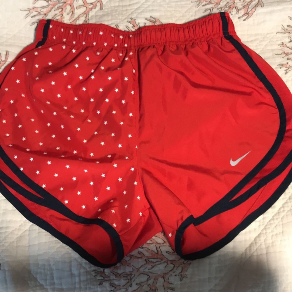 Red Nike running shorts